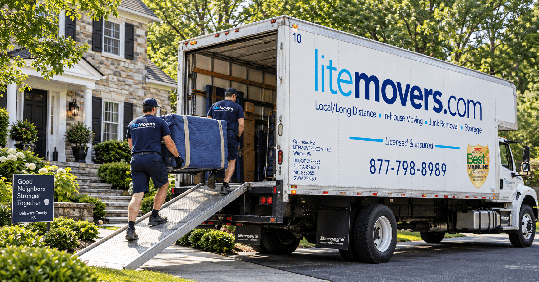 LiteMovers crew loading carefully packed items including electronics