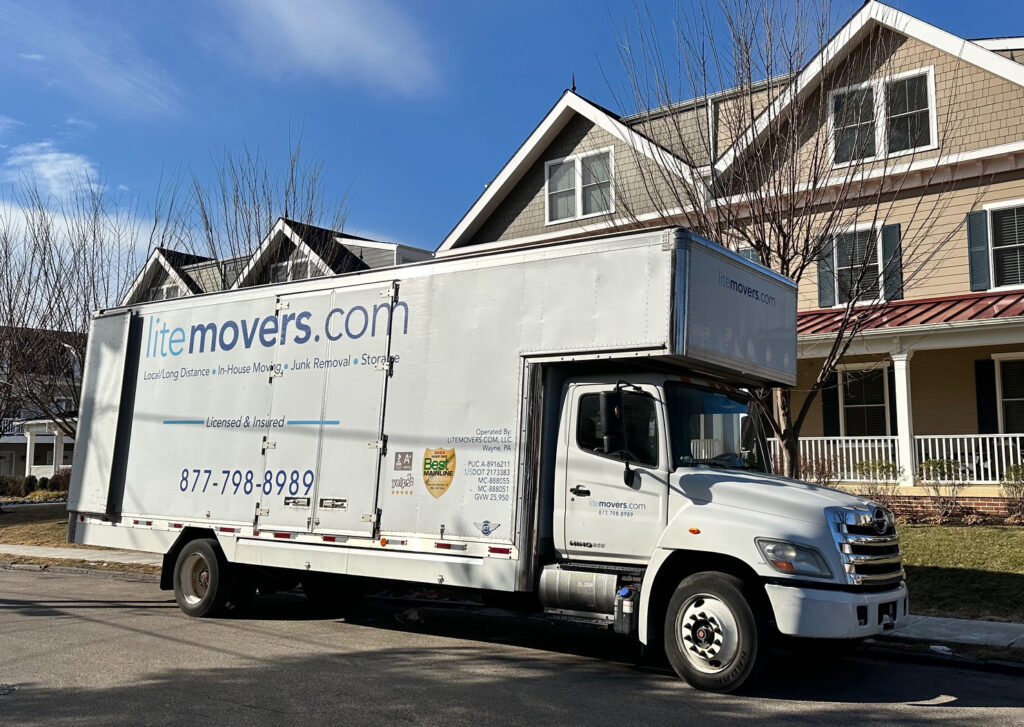 moving truck in front of a home in lower merion
